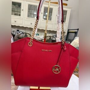 NWT Michael Kors Red Women's Large Jet Set Tote with Chain Accents.